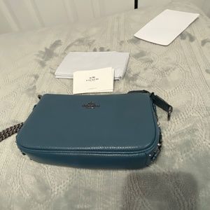 Coach blue Pouch bag W flowers on the sides + metallic sliver chain NWOT price